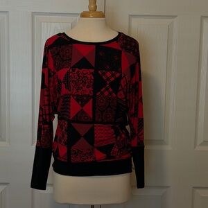 Joseph Ribkoff Red and Black Patterned Top. Banded bottom and sleeves. Sz 8.